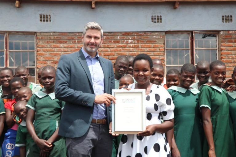 Queen of England honours 25 year old Malawi Teacher