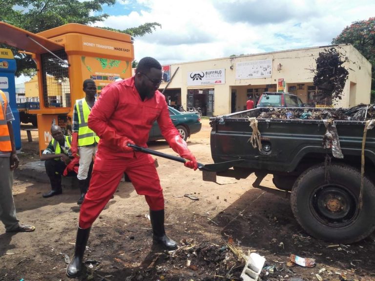 Mchinji Shadow MP  leads businesspersons in a clean-up exercise