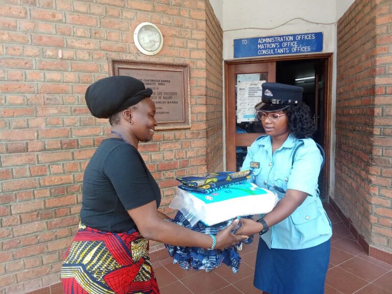 Chileka Police Officer donates to patients at Q.E.C.H